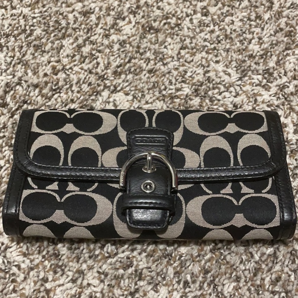 Black and silver coach wallet